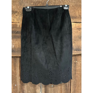 Women’s black suede leather skirt by Danier leather‎ with pattern. Size 4